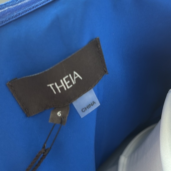 Theia Blue Asymmetrical Ruffled Strapless Gown - Picture 9 of 9